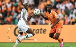 Victor Osimhen (L) in action for Nigeria against hosts Ivory Coast during the group stage