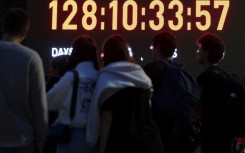 Relatives and supporters of Israeli hostages held in Gaza look at a screen showing showing the days, hours, minutes and seconds since the October 7 attack