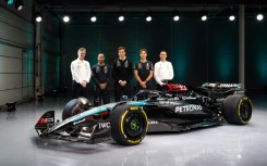Lewis Hamilton (second from left) wants to get Mercedes 'back to where we once were' as he starts his final season with the team