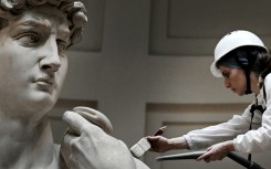 Italian restorer Eleonora Pucci cleaning David