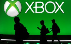 The head of Microsoft's Xbox team says it is not changing its 'fundamental' strategy of exclusive video games but wants to reach as many players as possible with strategic decisions