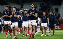 Charles Ollivon (C) after the draw to Italy
