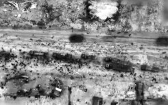 Another image grab from the video released by the Israeli army shows what the army says are Gazans mobbing aid trucks in Gaza City