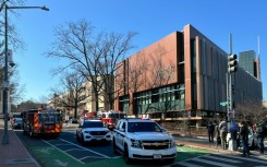US Secret Service vehicles block access to a street leading to the Embassy of Israel in Washington, DC on February 25, 2024 after a man self-immolated there