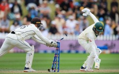 Australia's Usman Khawaja is stumped by New Zealand wicketkeeper Tom Blundell during day three of the first Test