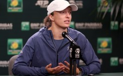 World number one Iga Swiatek of Poland fields questions from the media before the Indian Wells WTA-ATP Masters