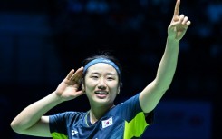 An Se-young celebrates after winning against Japan's Akane Yamaguchi