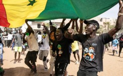 Thousands of Faye's supporters filled a sandy football pitch in a northern district of Dakar