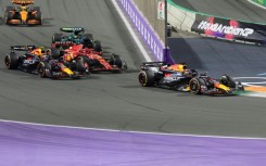 Max Verstappen leads his Red Bull teammate Sergio Perez to victory in Jeddah 