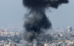 Smoke billows after Israeli bombardment of northern Gaza on March 13, 2024