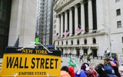 US shares had hit record highs Monday, but have largely churned sideways this week as investors digested a mixed bag of economic reports ahead of a key Fed meeting next week