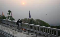 Thai tourist hotspot Chiang Mai was blanketed by hazy smog Friday, as residents and visitors to the usually picturesque northern city were left wheezing in the toxic air
