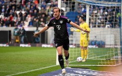 Harry Kane celebrates his goal against Darmstadt, which broke the record for the most Bundesliga goals in a debut season