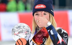 Thumbs up: Mikaela Shiffrin with her slalom globe after taking her World Cup tally to 97 