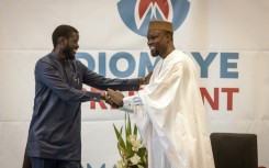 Ousmane Sonko (R) and Bassirou Diomaye Faye (L) during a press conference in Dakar on March 15, 2024