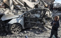 Palestinian homes destroyed by an Israeli air strike in Rafah, southern Gaza, on March 9