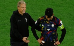 Jurgen Klinsmann and Son Heung-min after a defeat in Qatar