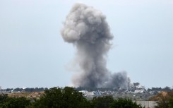 Smoke rises over Gaza after Israeli bombardments of the warn-torn territory