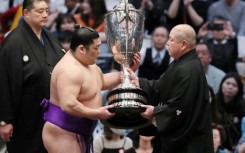 It is the first time since 1914 that a wrestler has won their first tournament in sumo's top "makuuchi" division