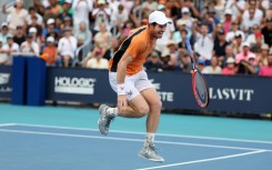 Andy Murray of Great Britain screams in pain after hurting his left ankle during his match against Tomas Machac of the Czech Republic on Day 9 of the Miami Open at Hard Rock Stadium on Sunday.