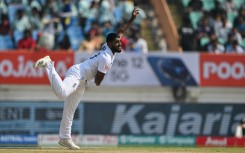 Relaxed over home debut: England leg-spinner Rehan Ahmed pictured bowling in the third Test against India at Rajkot in February 