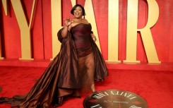 Pop star Lizzo, seen here attending the 2024 Vanity Fair Oscar Party, said she is "tired of putting up with being dragged by everyone in my life and on the internet"