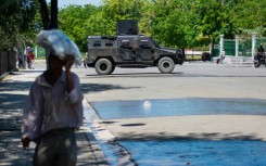 A police vehicle monitors the area near the National Palace in Port-au-Prince, Haiti, on April 2, 2024