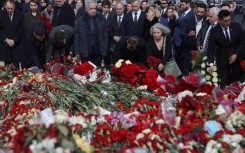 Macron told reporters that any suggestion France might have been involved in the deadly attack in Moscow were 'ridiculous'