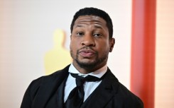 Actor Jonathan Majors, seen at the 2023 Oscars, has avoided jail time after being convicted of third-degree assault but must attend domestic violence counseling