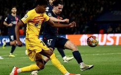 Barcelon forward Lamine Yamal (L) has burst into the limelight this season with dynamic performances on the right wing