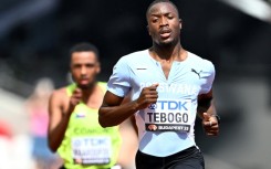 Letsile Tebogo leads a 200 metres heat during the 2023 world championships in Budapest.