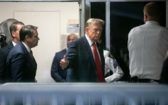 Former US president Donald Trump returns to the courtroom after a break 
