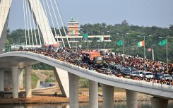 The Ivory Coast team, winners of the 2024 African Cup of Nations (CAN), and supporters on the Alassane Ouattara bridge in Abidjan in February