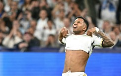 Real Madrid's Brazilian forward Rodrygo celebrates scoring against Man City in the first leg
