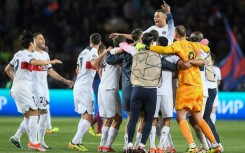 Kylian Mbappe and his teammates celebrate after Paris Saint-Germain beat Barcelona to reach the Champions League semi-finals
