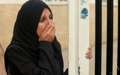 A Palestinian woman mourns the death of a loved one at Al-Najjar hospital following overnight Israeli bombardment in Rafah in the southern Gaza Strip on April 18, 2024