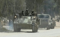 Israeli troops along the border with Gaza