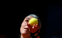 Ons Jabeur serving to Jelena Ostapenko in Madrid