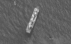 A US vessel and sections of a floating dock, off the war-torn Gaza Strip, seen in a satellite image courtesy of Maxar Technologies taken on April 29, 2024 