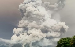 An eruption from Mount Ruang volcano is seen from neighbouring Tagulandang island