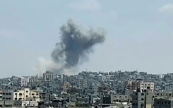 Large plume of smoke rises after strike in Gaza's Jabalia