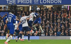 Chelsea's Trevoh Chalobah (R) scores against Tottenham