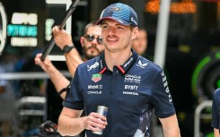 Red Bull Racing's Dutch driver Max Verstappen walks in the paddock ahead of the 2024 Miami Formula One Grand Prix. 