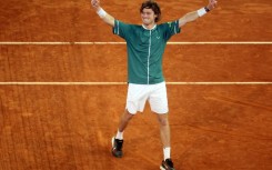 Russia's Andrey Rublev celebrates beating Canada's Felix Auger-Aliassime in the Madrid Open final on Sunday