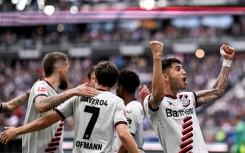 Exequiel Palacios celebrates scoring a penalty in Bayer Leverkusen's 5-1 win over Eintracht Frankfurt