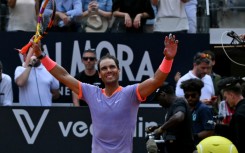 A relieved Rafael Nadal battled through to the second round of the Rome Open with a hard-fought wihjn over qualifier Zizou Bergs