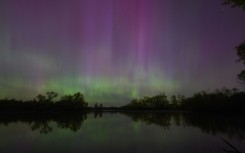 Northern lights or aurora borealis are seen over London during a geomagnetic storm on May 11, 2024