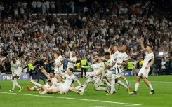Real Madrid's players celebrate victory at the end of the Champions League semi-final second leg against Bayern Munich
