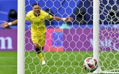 Faisal Halim, seen here scoring against South Korea at the Asian Cup in January, is "responding well" to treatment after being splashed with acid