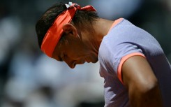 Spain's Rafael Nadal fell to a second-round defeat in Rome ahead of the French Open